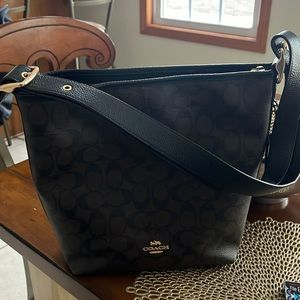 Coach Signature Purse. Excellent condition. Dimensions: 11 by 12